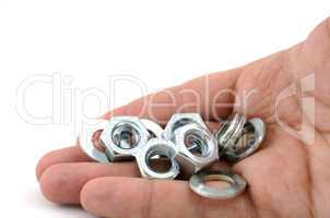 Several metal screw washers and nuts