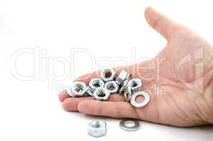 Several metal screw washers and nuts