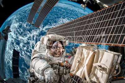 International Space Station and astronaut.