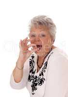 Senior woman swallowing vitamin pill.
