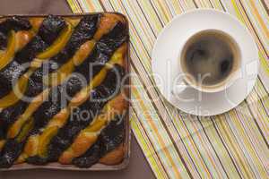 Coffee and cake with poppy seeds and orange