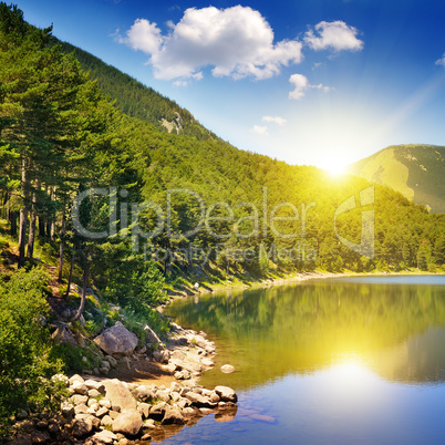 picturesque lake, mountains and blue sky