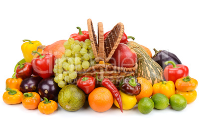 vegetables and fruits in a basket isolated on white background