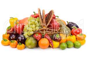 vegetables and fruits in a basket isolated on white background