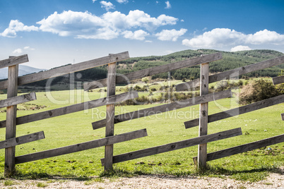 Wooden fence on a mountain ranch