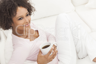 Mixed Race African American Young Woman Drinking Coffee Tea