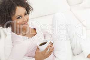 Mixed Race African American Young Woman Drinking Coffee Tea