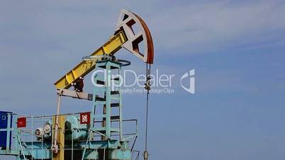 working in the desert Oil Pump Jack