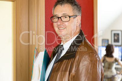 Businessman with file folders