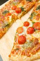 Pizza with mozzarella and tomatoes