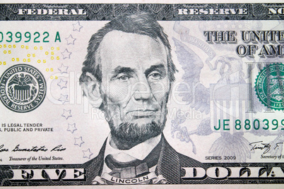 five dollars with image of Abraham Lincoln