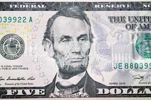 five dollars with image of Abraham Lincoln