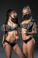 Hot dancers in studded costumes and respirators