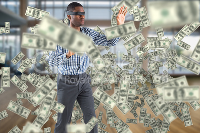 Composite image of blindfolded businessman with arms out