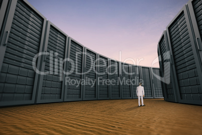 Composite image of rear view of businessman walking on white background