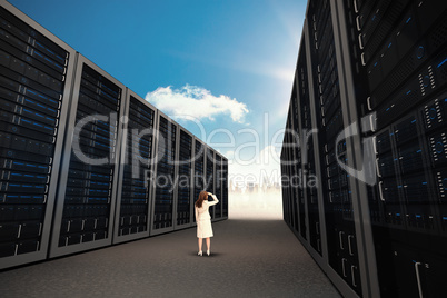 Composite image of rear view of young businesswoman looking away