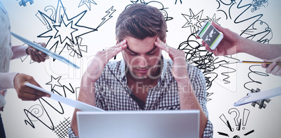 Composite image of businessman stressed out at work