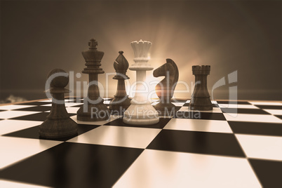 Composite image of white queen surrounded by black pieces