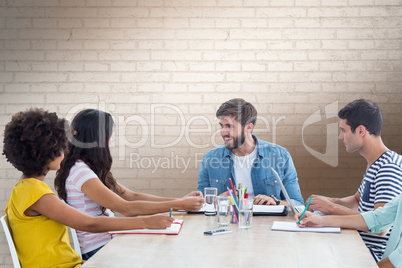 Composite image of business people during a meeting