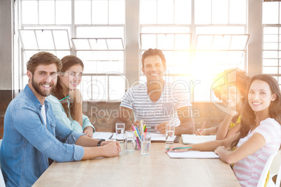 Composite image of business people during a meeting