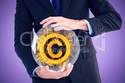 Composite image of mid section of a businessman presenting with his hands