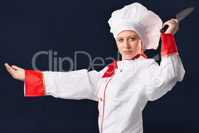 Composite image of pretty chef slicing with knife