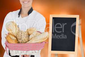 Composite image of woman holding bread bag