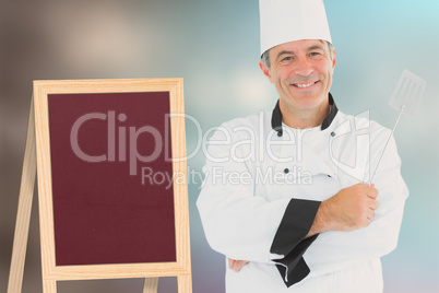 Composite image of a cook holding utensil