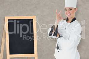 Composite image of happy female chef
