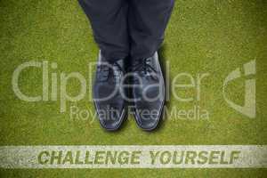 Composite image of businessmans feet in black brogues
