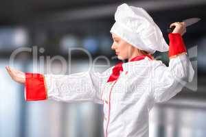 Composite image of pretty chef slicing with knife