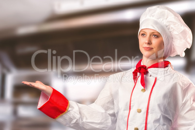 Composite image of pretty chef standing with hands out