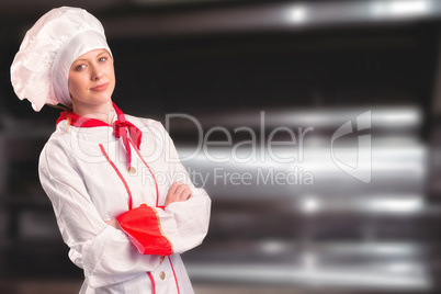 Composite image of pretty chef standing with arms crossed