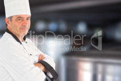 Composite image of confident chef with arms crossed