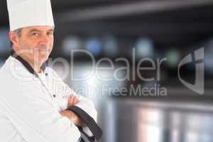 Composite image of confident chef with arms crossed