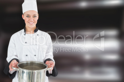 Composite image of happy female chef holding kitchen utensil