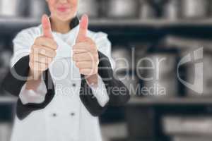 Composite image of chef showing thumbs up sign
