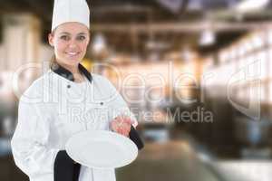Composite image of young woman in chef uniform showing an empty plate
