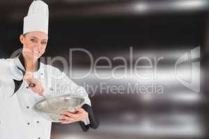 Composite image of happy female chef holding wire whisk and mixing bowl