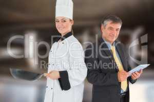 Composite image of businessman holding digital tablet and chef with frying pan