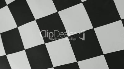 Closeup of black and white checkered flag
