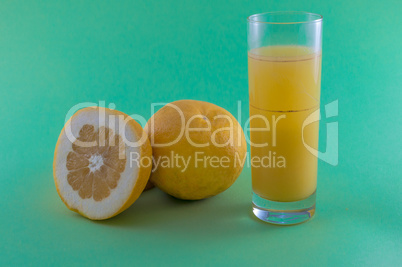 grapefruit juice on colored background