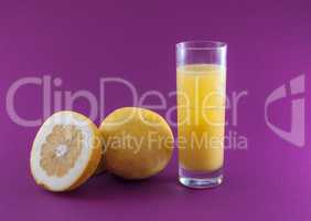 grapefruit juice on colored background