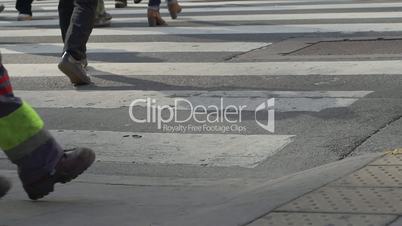 Feet crossing the street in downtown Buenos Aires in slow motion series 2