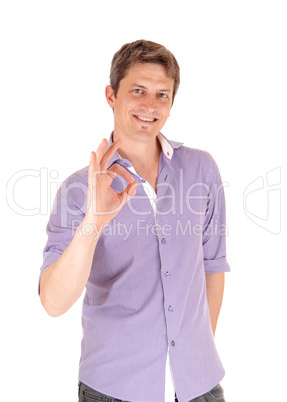 Smiling man giving OK with fingers.