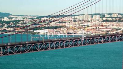 Traffic on the 25 de Abril Bridge in Lisbon, Portugal. pan imelapse