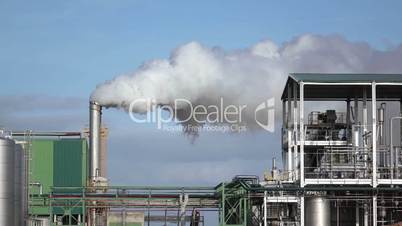 Steaming Pipe on Blue Sky Background, sunny day