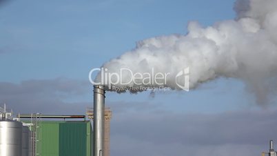 Steaming Pipe on Blue Sky Background, sunny day