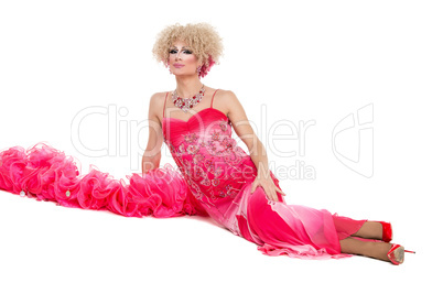 Drag Queen in Pink Evening Dress Lying on Floor