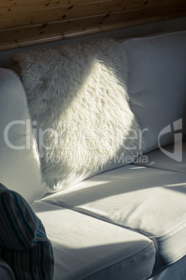 Sunbeam Falls on a White Sofa